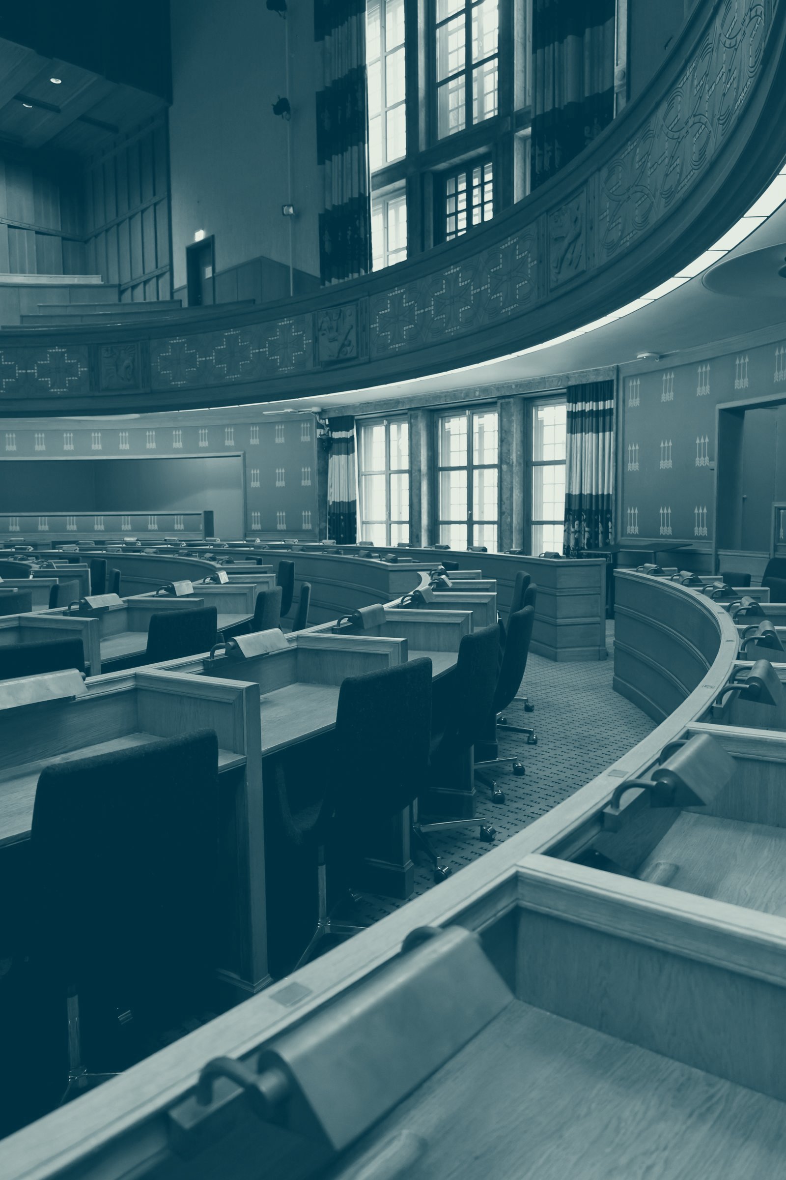 Conference hall with tiered wooden seating